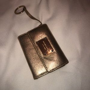 Shimmering gold Micheal Kors wallet